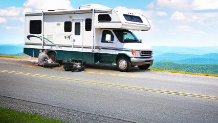 Mobile rv technician working on a roadside repair near the blue ridge mountains