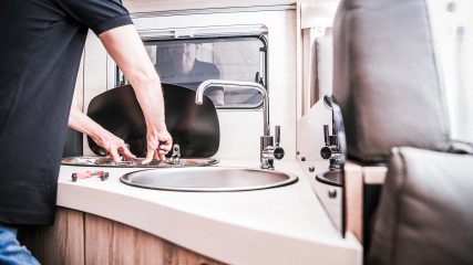 Rv kitchen stove being serviced by dan dan the rv man in greenville sc