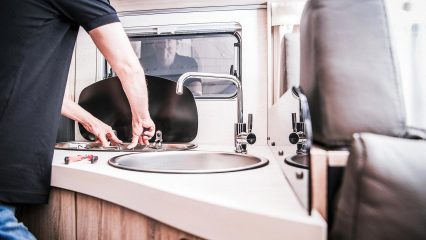 Rv kitchen stove being serviced by dan dan the rv man in greenville sc