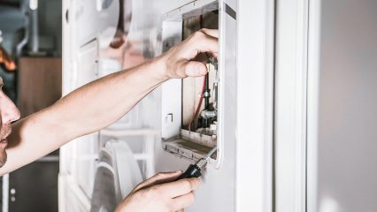 Dan repairing rv water heater access panel for cavu rv in upstate south carolina