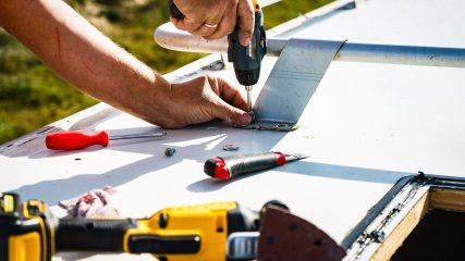 Dan dan the rv man sealing rv roof edge during mobile repair in greenville sc